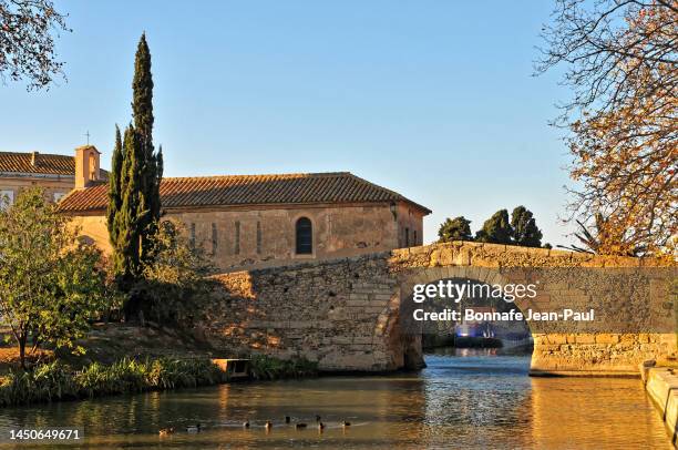 the stone bridge of the sommail - aude stock pictures, royalty-free photos & images