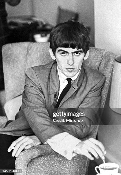 George Harrison pictured at the London residence of Daily Mirror show biz journalist, Donald Zec, 9 September 1963, as part of an early Mirror...