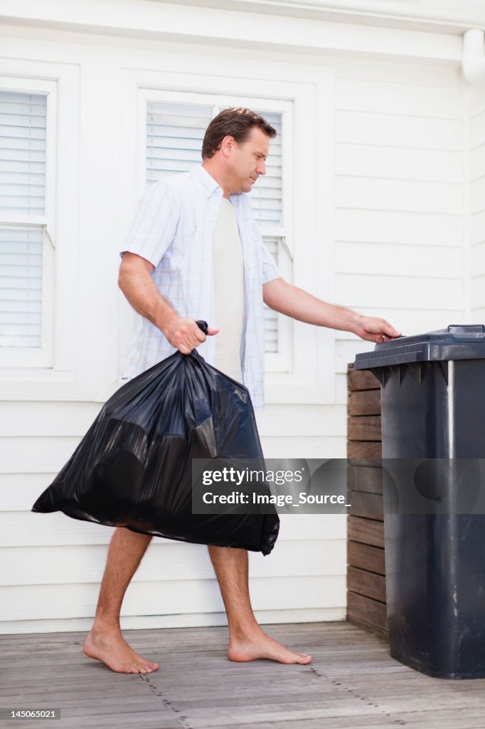 Man taking out garbage