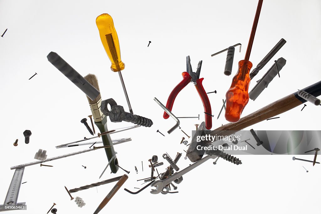 Hand tools and equipment against a white background