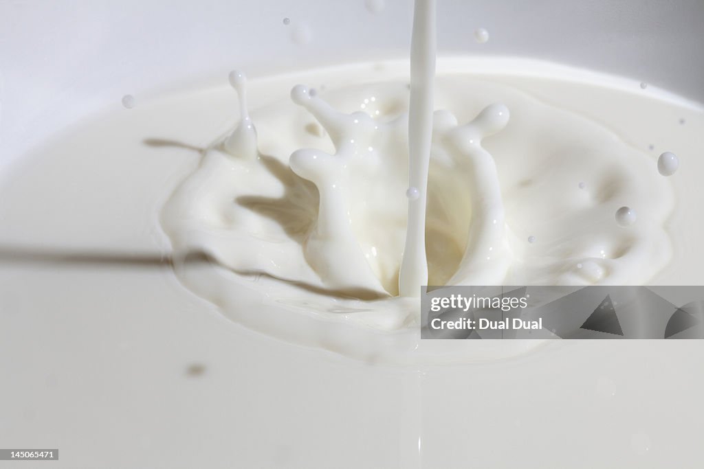 Close-up of milk being poured