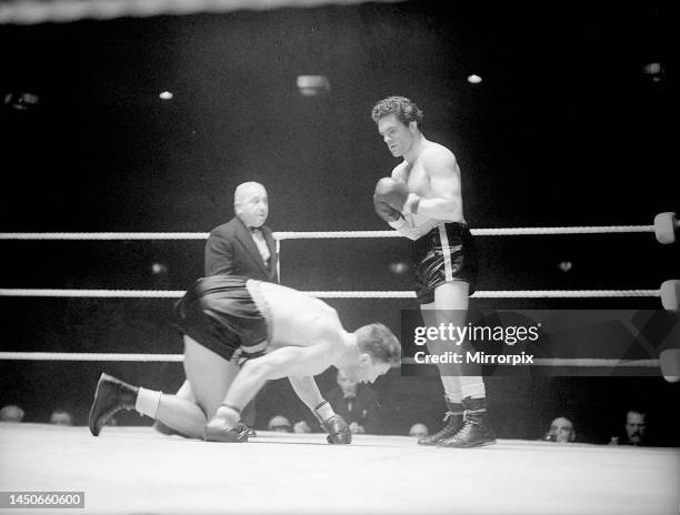 Freddie Mills, the boxer, in action. July 1949.