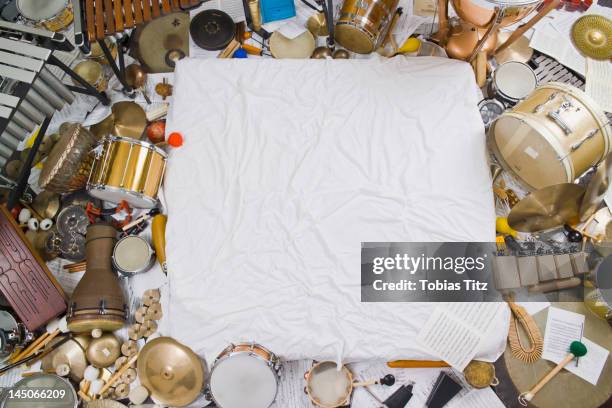 Pile Of Musical Instruments Photos and Premium High Res Pictures ...