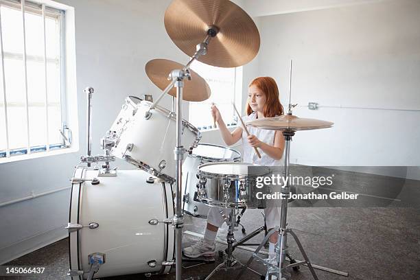 girl plays drum kit - drum kit stock pictures, royalty-free photos & images