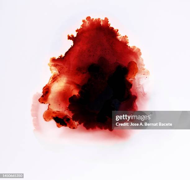 drop of blood on slides on a white surface. - blood splatter foto e immagini stock