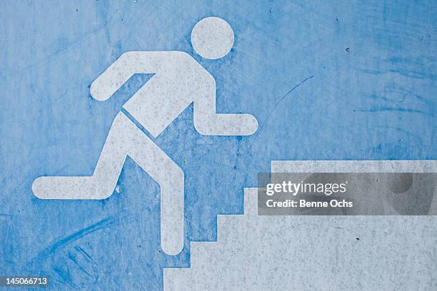 detail of an exit sign - exit sign stock illustrations