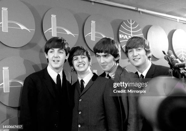 The Beatles answer questions for newsmen and journalists in New York after their arrival for their first tour of America. Left to right: Paul...