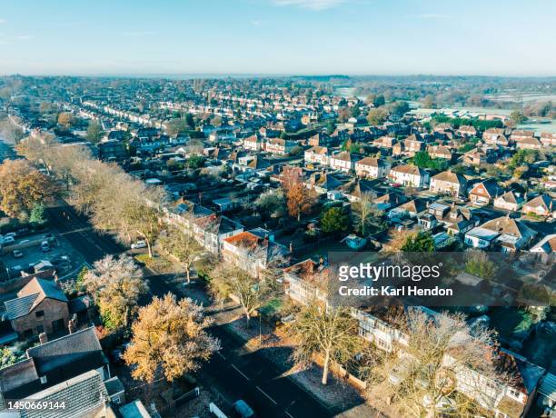 a sunrise view of frost covered houses and back gardens - weybridge stock pictures, royalty-free photos & images