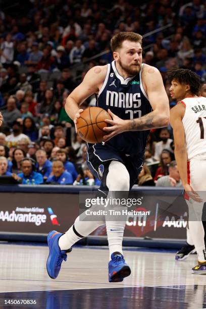 Luka Doncic of the Dallas Mavericks drives to the basket against the Portland Trail Blazers in the second half at American Airlines Center on...