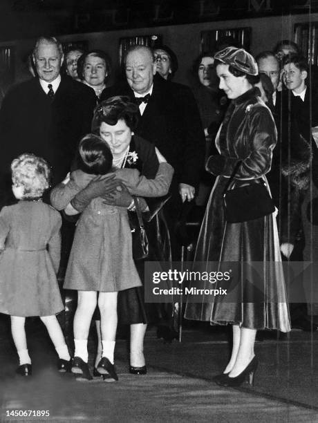 Queen Mother saying goodbye to her grandson Prince Charles watched by his aunt Princess Margaret and British Prime Minister Winston Churchill at...