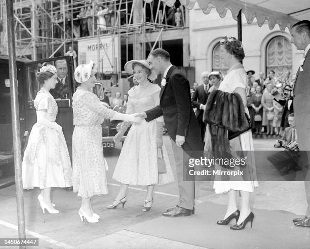The Queen Mother and Princess Margaret seen here attending the wedding reception of Lady May Billie Hamilton and Mr Adam BailyJuly 1954.