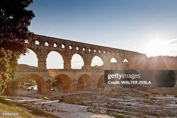 pont du gard bridge over river - pont du gard ストックフォトと画像