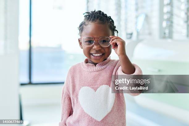 shop, glasses and eyes of black child with vision healthcare, frame check or choice in retail with kids medical insurance. eye care, store and african girl with lens for promotion sale. or marketing - oogmeetkunde stockfoto's en -beelden