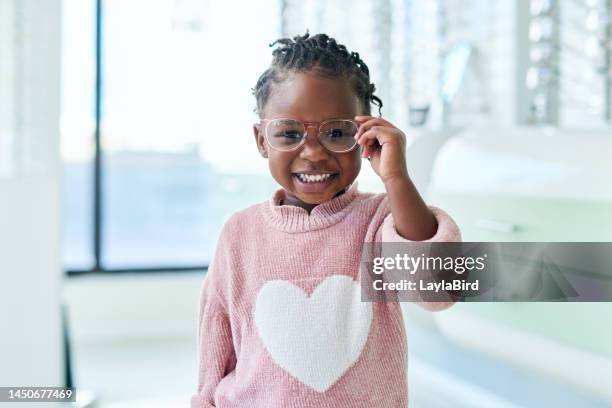 shop, glasses and eyes of black child with vision healthcare, frame check or choice in retail with kids medical insurance. eye care, store and african girl with lens for promotion sale. or marketing - youth bildbanksfoton och bilder