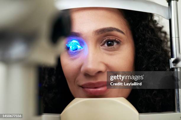 vision eye exam, machine light and patient at eye care clinic for medical consultation, ocular healthcare or glaucoma test. uv check, ophthalmology and black woman face with slit lamp to study cornea - eye test equipment bildbanksfoton och bilder