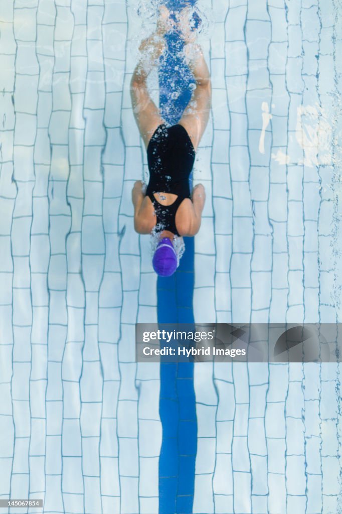 Swimmer following pool lane