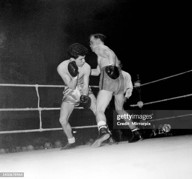 Dai Dower in action during his fight against Wildabold Koch in their Super Flyweight contest at Sophia Gardens Pavilion, Cardiff. 10th January 1955.