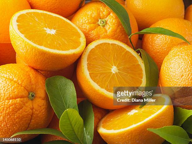 close up of sliced oranges - orange fruit ストックフォトと画像