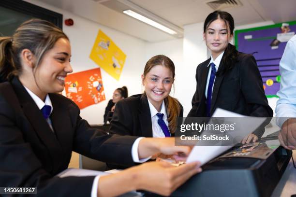 teamwork in music class - secondary school classroom uk stock pictures, royalty-free photos & images