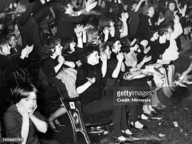 Beatles at the Globe Theatre, Stockton show the fans clapping and screaming. 22nd November 1963.