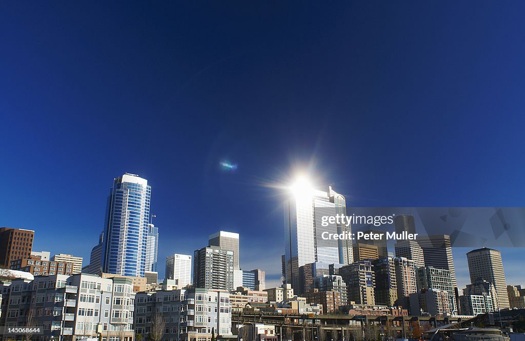 Seattle city skyline against blue sky