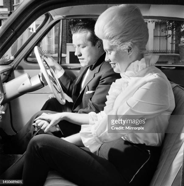 Tina Butler, a female driving instructor seen here giving a driving lesson. 6th September 1962.