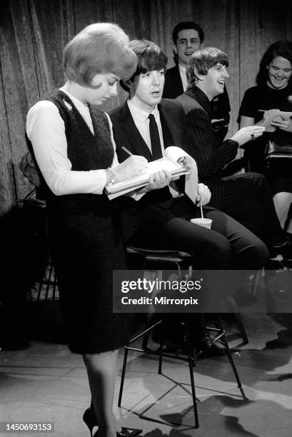 Paul McCartney talking to a reporter in New York. February 1964.