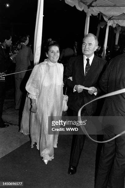 Clarissa Kaye and James Mason attend a party on the 20th Century Fox lot in Century City, California, on February 28, 1983.