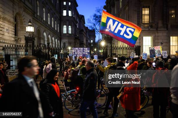 Workers and supporters gather outside Downing Street to protest during the second day of strike action by NHS nurses, on December 20, 2022 in London,...