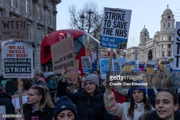 Nurses and supporters march down Whitehall after a day of strike action on December 20, 2022 in London, England. The Royal College of Nursing has...