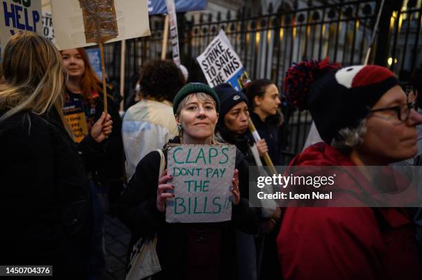 Workers and supporters gather outside Downing Street to protest during the second day of strike action by NHS nurses, on December 20, 2022 in London,...