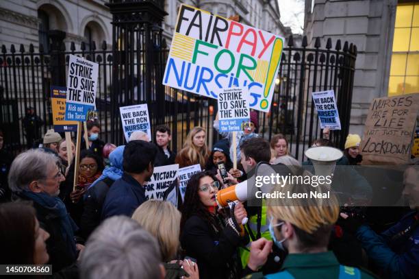 Workers and supporters gather outside Downing Street to protest during the second day of strike action by NHS nurses, on December 20, 2022 in London,...