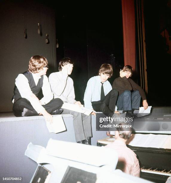 The Beatles running through a 'Flying Ballet' routine with sketch director Joseph Kirby during rehearsals for 'The Night Of 100 Stars' charity revue,...