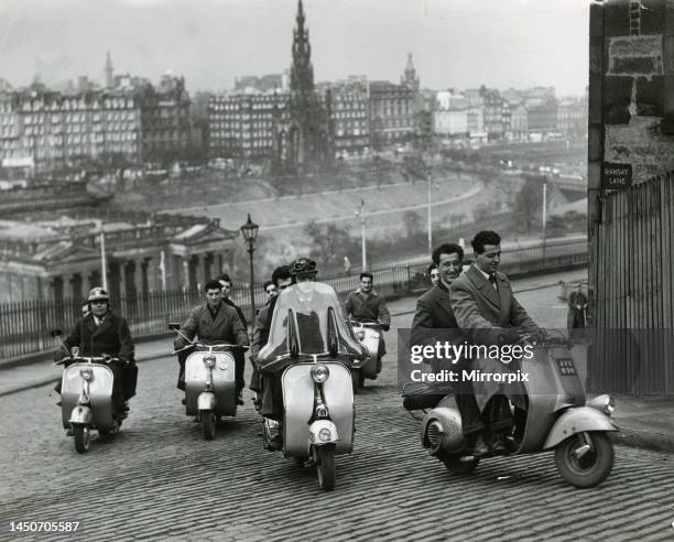 Italian Vespa Club of Edinburgh riding their scooters at The Mound, February 1954.