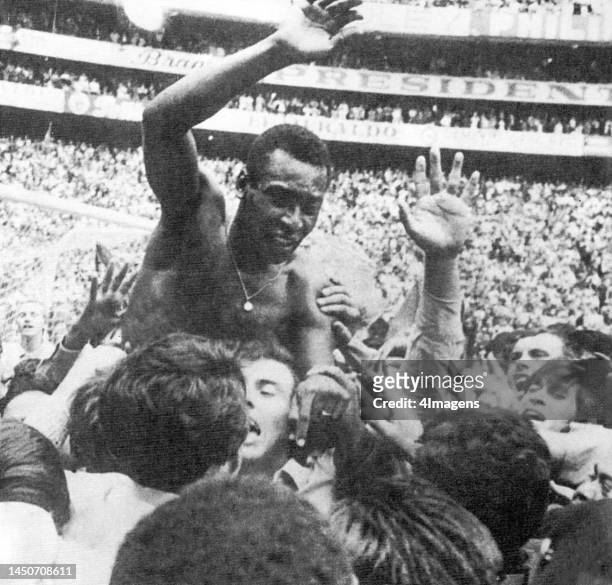 Pelé is chaired off the Azteca Stadium pitch after Brazil had won the World Cup trophy for the third time after defeating Italy 4-1 on June 21, 1970...