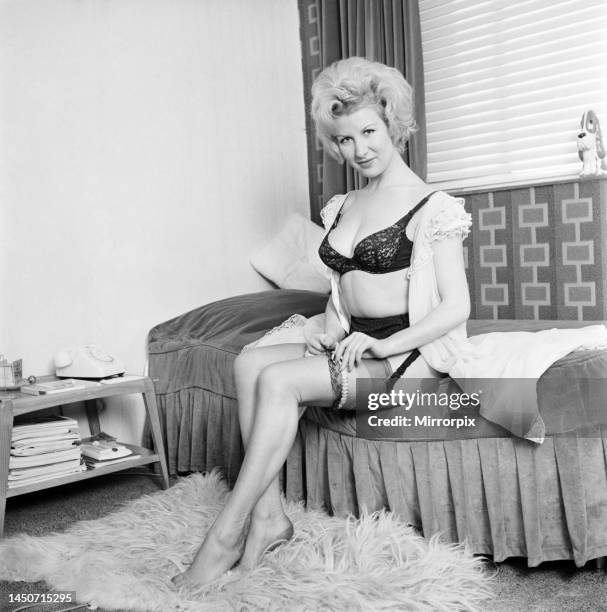 Caron Gardner modelling bra, knickers and suspenders. November 1963.