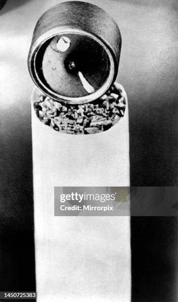 World War Two - Second World War - Prisoners of war - This tiny compass could be concealed inside a cigarette. Circa: April 1956.