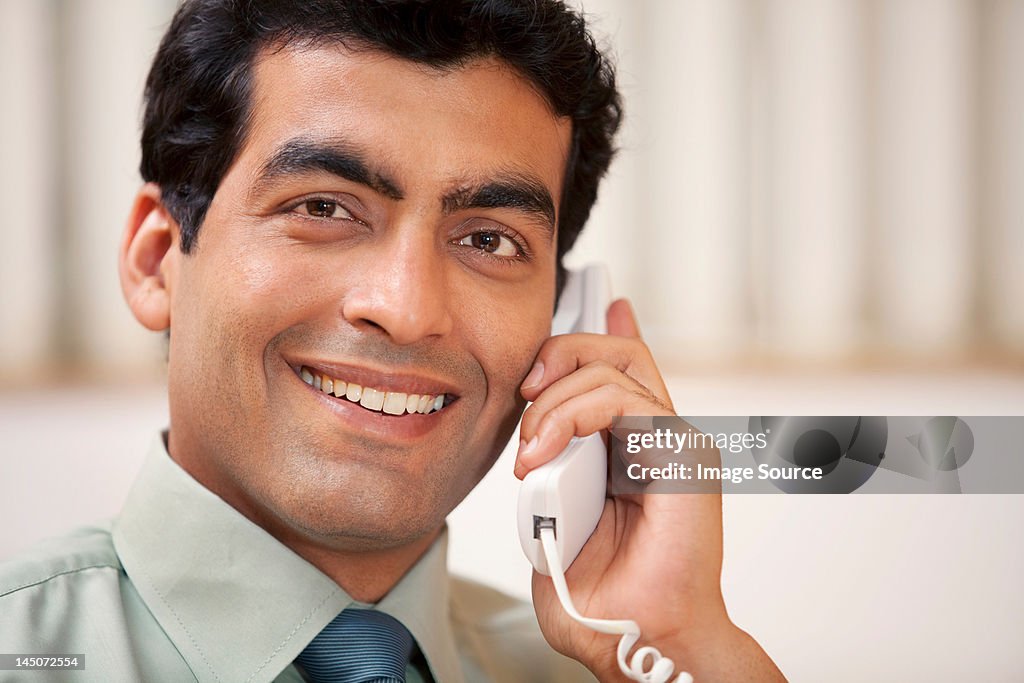 Business executive talking on the phone