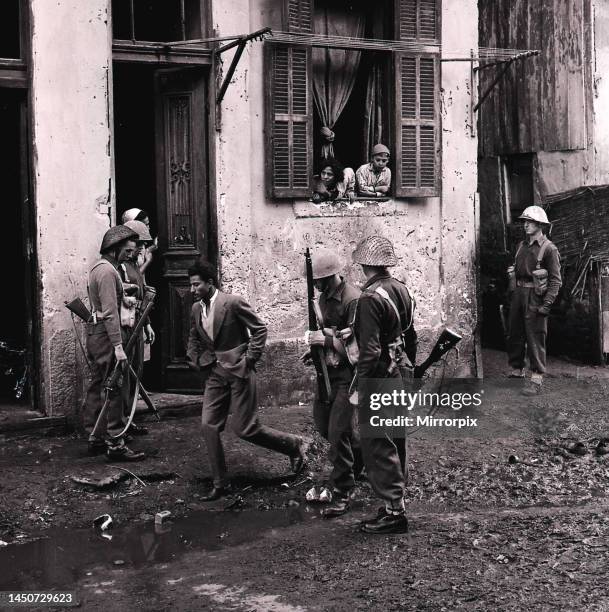 Suez Crisis 1956 - Troops of D Company 1st Battalion Argyll and Sutherland Highlanders carry out a search of houses in the Arab Town district of Port...