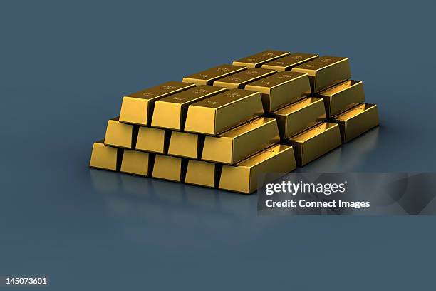 stapel gold bars - goldbarren stock-fotos und bilder