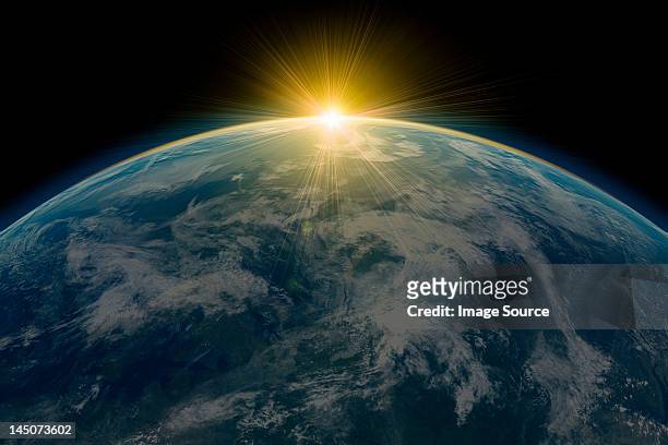 illustrazioni stock, clip art, cartoni animati e icone di tendenza di sunrise over planet earth - raggio di sole