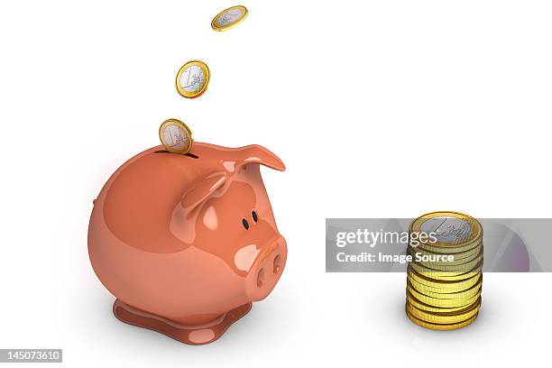 euro coins going into piggy bank - 1 euro stock-grafiken, -clipart, -cartoons und -symbole