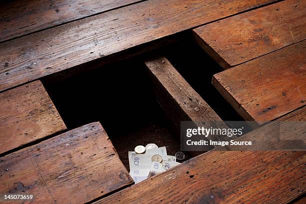 money under floorboards - loose change private view stock pictures, royalty-free photos & images