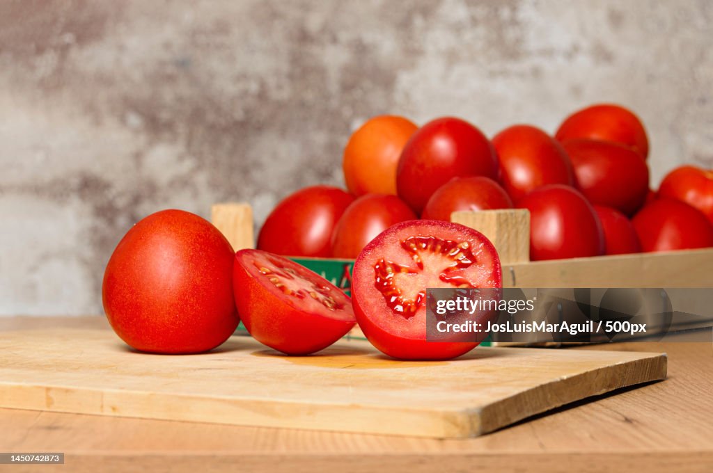 Close-up of tomatoes on cutting board,Spain