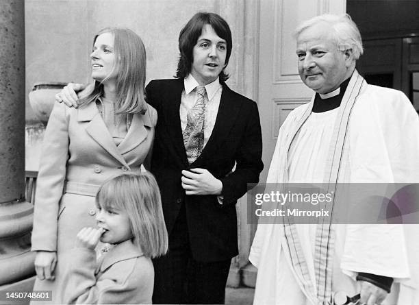 Paul McCartney, Linda Eastman and Linda's six-year old daughter, Heather on Paul and Linda's wedding day with the Reverend Noel Perry Gore. March...