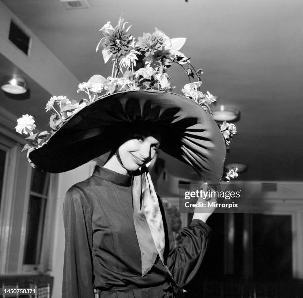 The London Tourist Board in London held the finals of their Easter Bonnet Competition. The winner in the Mad Hat Class was made by full time student...