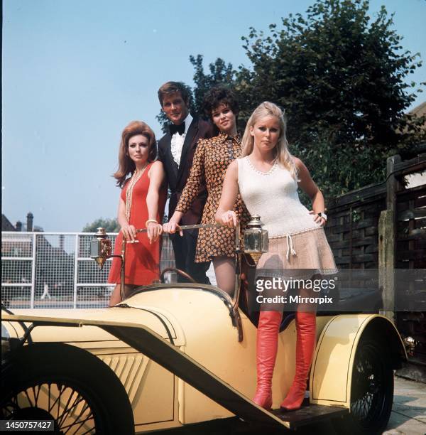 Roger Moore with Claudie Lange, Gabrielle Drake and Veronica Carlson, the co-stars in the film Crossplot.