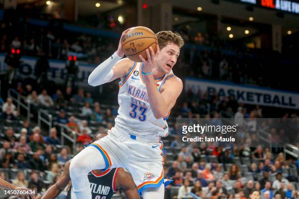 Mike Muscala of the Oklahoma City Thunder grabs a rebound during the fourth quarter against the Portland Trail Blazers at Paycom Center on December...