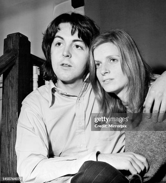 Beatles singer Paul McCartney with his new bride Linda Eastman. They are pictured posing on the staircase at the home of Paul's father Jim in Gayton,...
