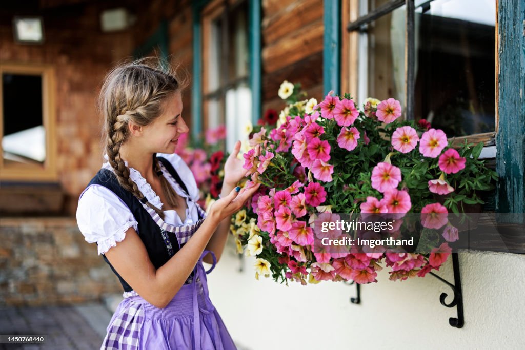 Portrait of a teenage girl wearing traditional Austrian dress - Dirndl